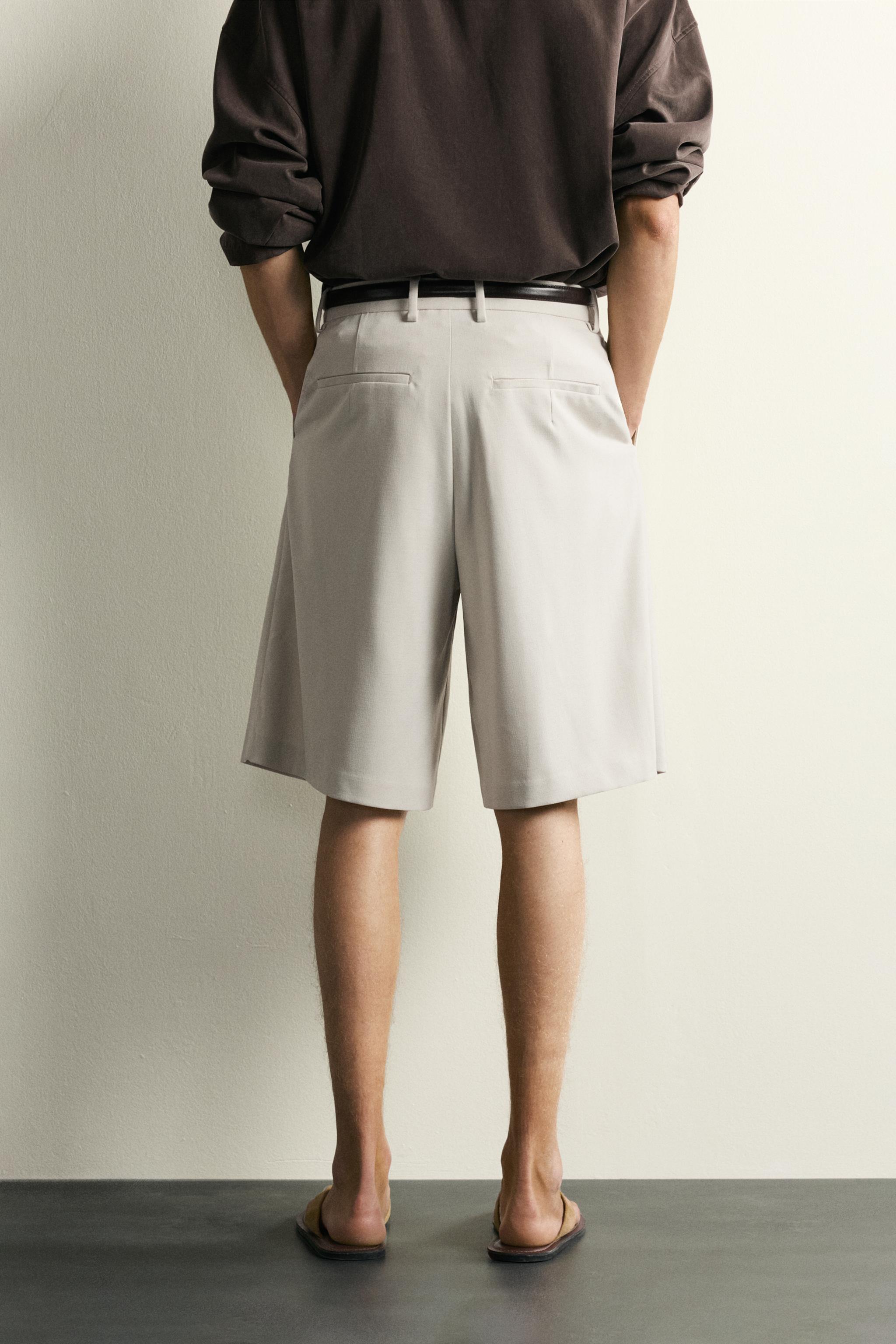 WIDE FIT PLEATED SHORTS